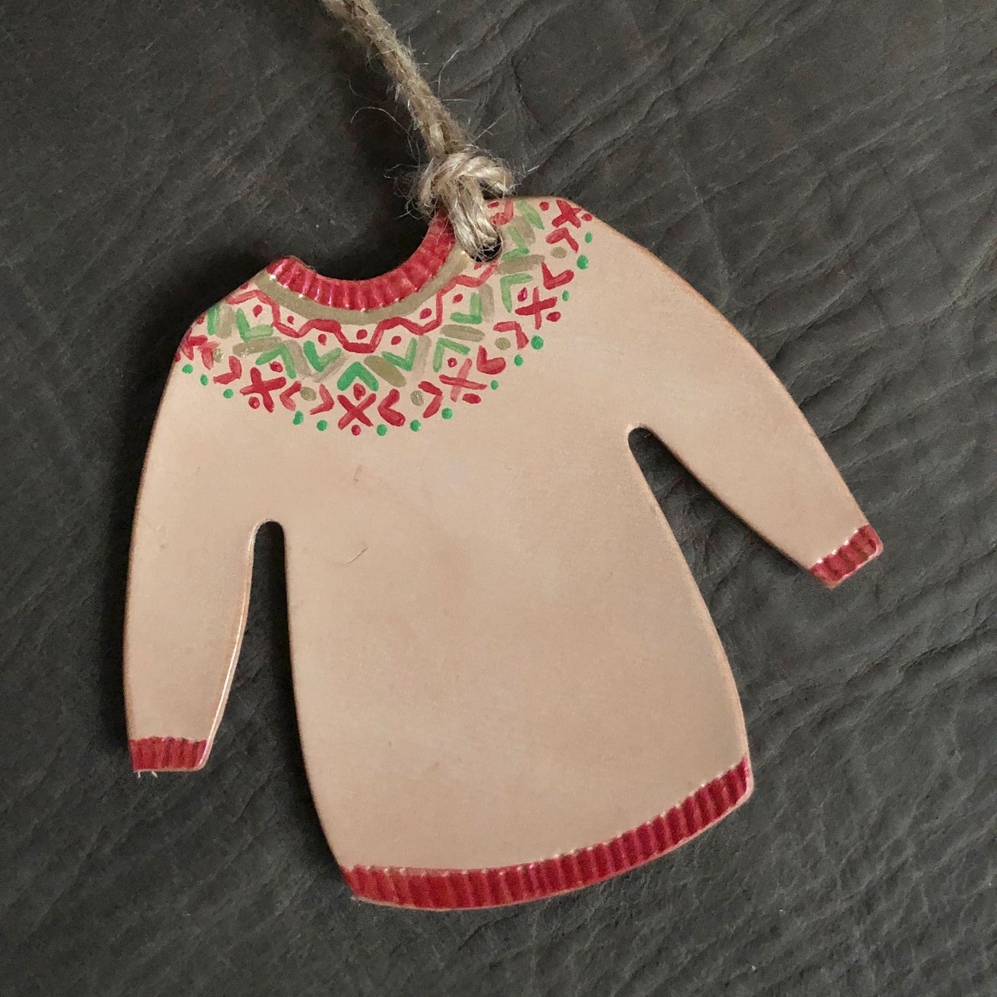 A red geometric patterned Christmas jumper tree ornament