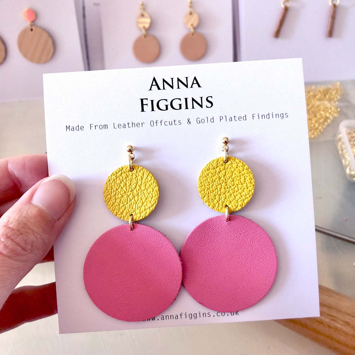 Large pink and yellow leather circle drop earrings